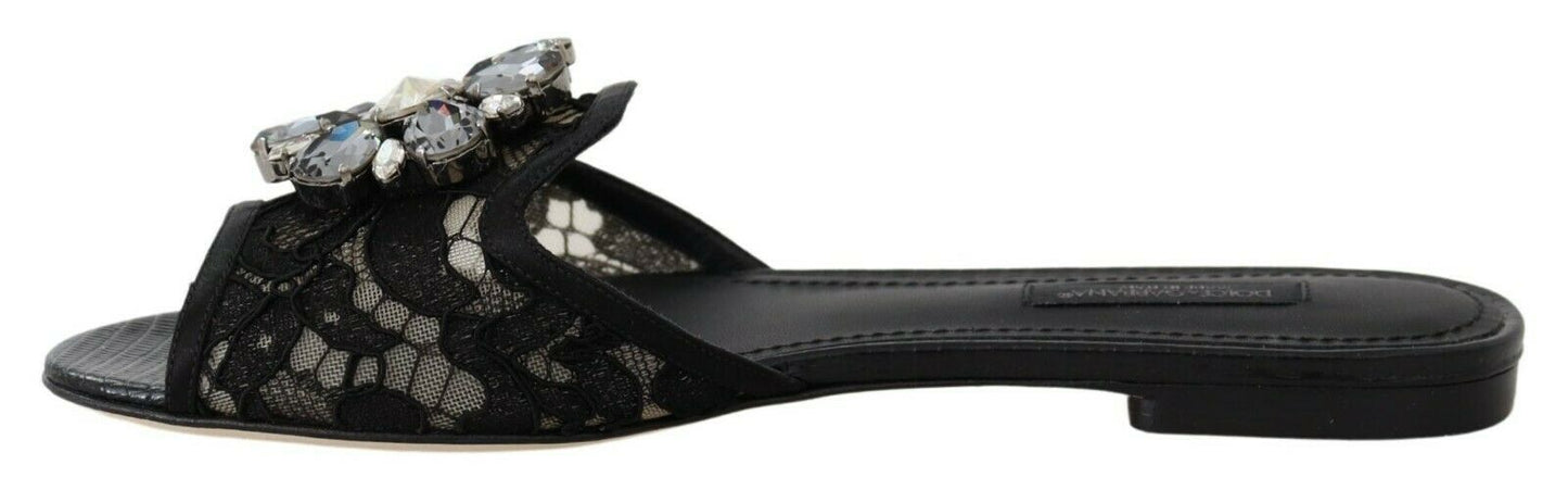 Dolce & Gabbana Elegante schwarze Pantoletten aus Spitze mit Blumenschmuck