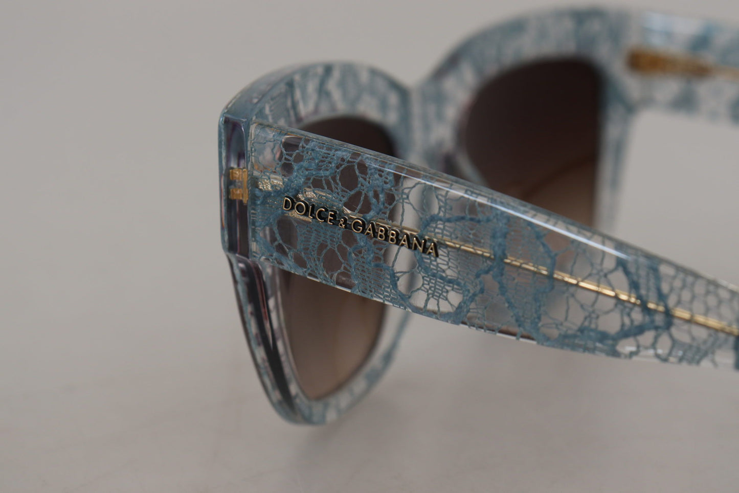 Dolce & Gabbana Elegante blaue Sonnenbrille mit Spitzendetail