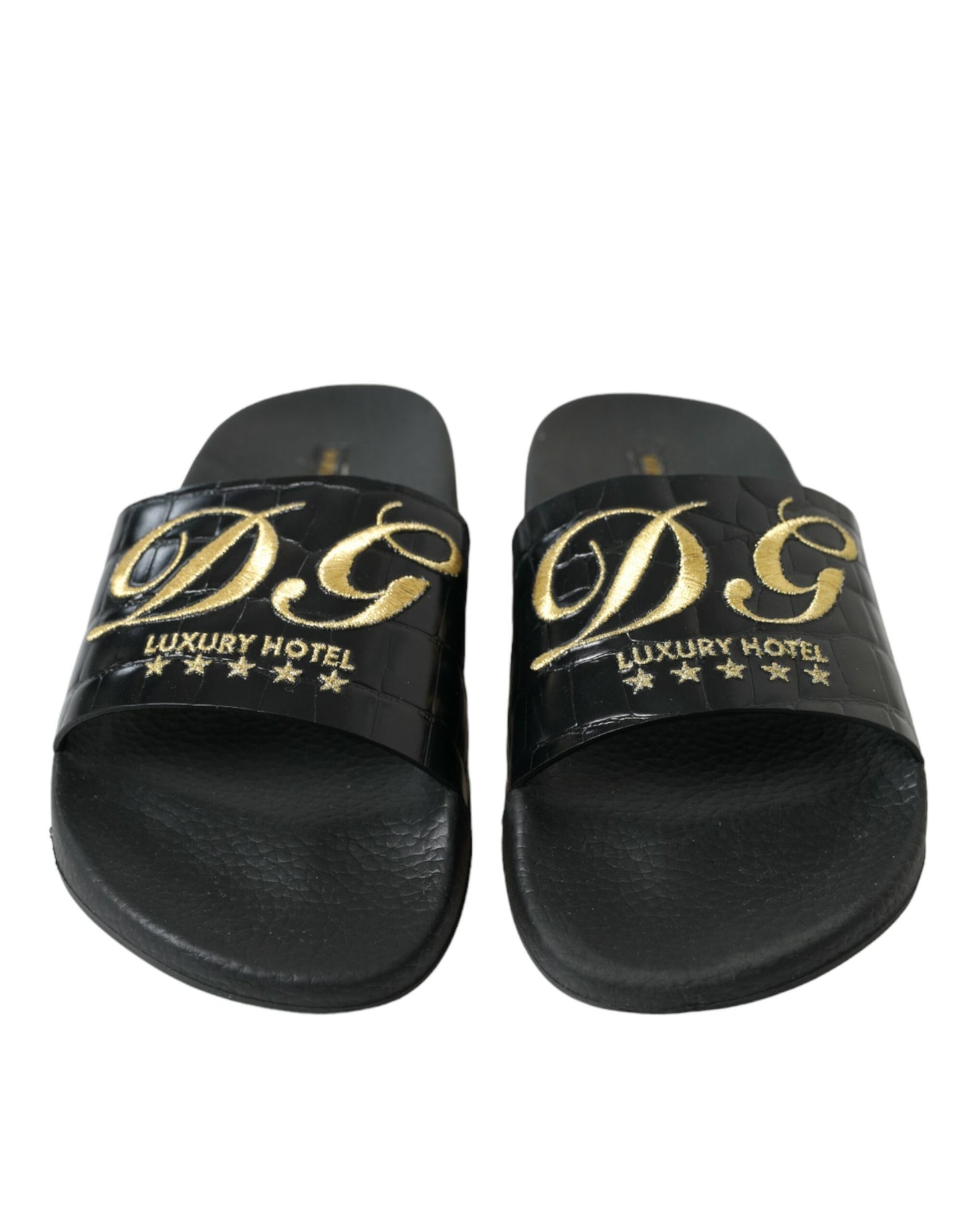 Dolce & Gabbana Elegante Lederrutschen in Schwarz und Gold