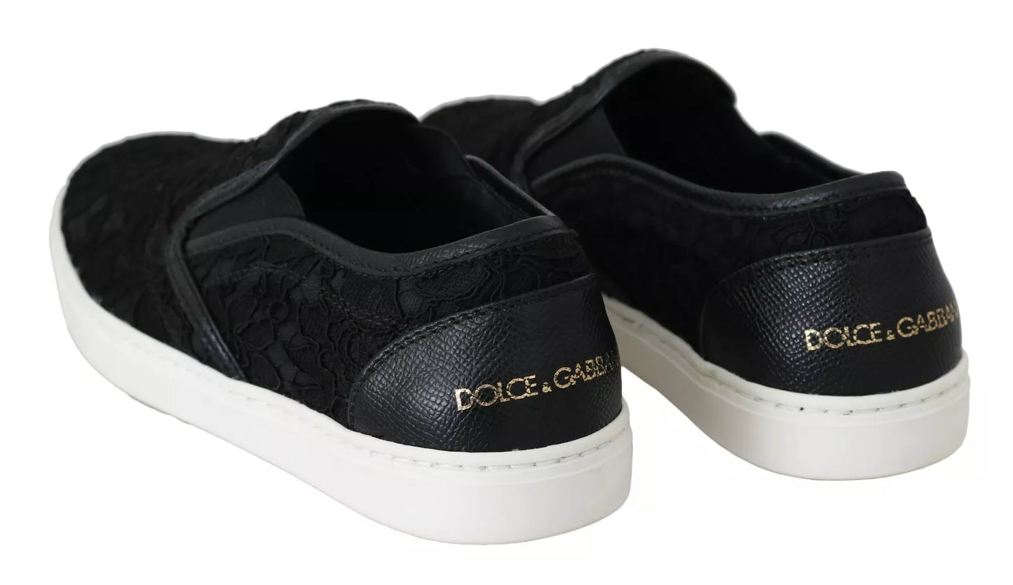 Dolce & Gabbana Flache Slip-On-Sneakers aus schwarzem Spitzenleder mit Logo